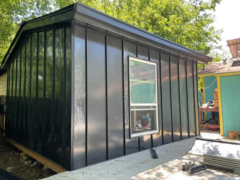 Black standing seam metal wall panels for Roof Inspection in Eugene